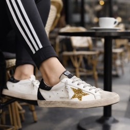 Golden Goose Super-Star In Nappa Leather With Gold Glitter Star And Black Glitter Heel tab